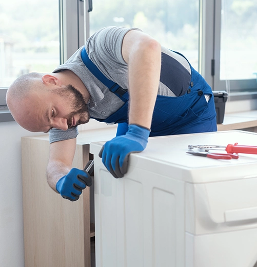 man installing washer